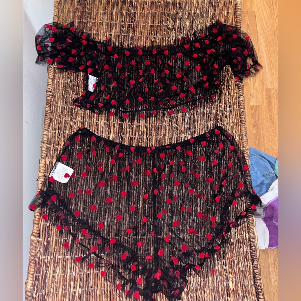 Cute lingerie piece. Sheer and super adorable!